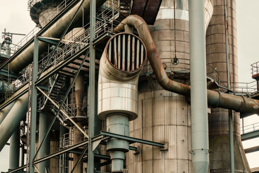 Industrial complex with large metal pipes and structures