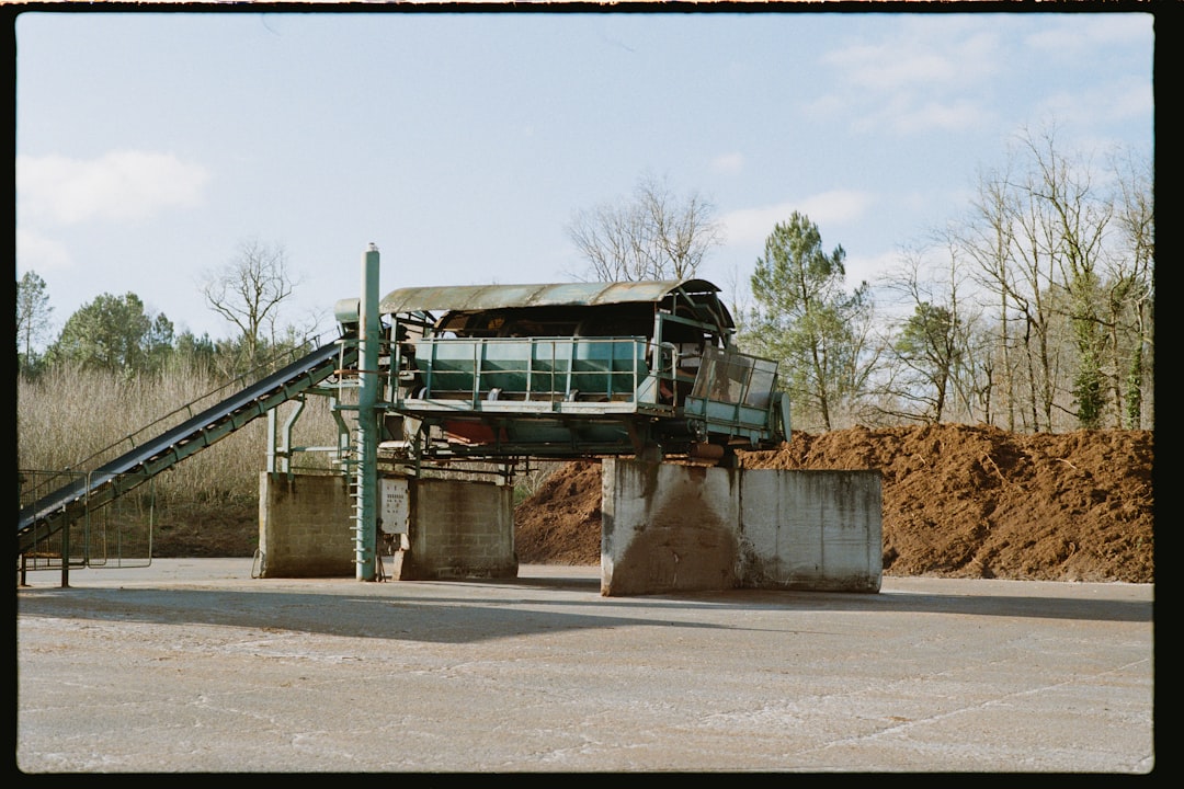 Industrial mining machinery and conveyor belts at phosphate processing facility
