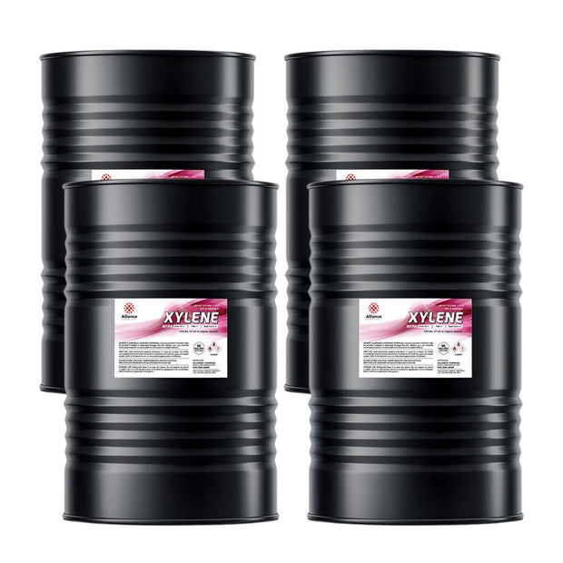 Four 55-gallon steel drums of Alliance Chemical Xylene with black bodies and product labels.