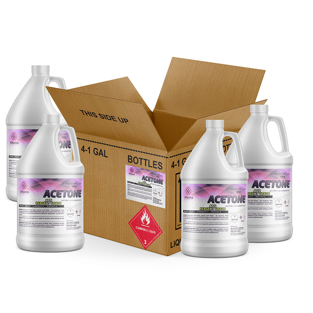 Four 1-gallon HDPE jugs of Alliance Chemical Acetone ACS Grade with handles and labels, inside a cardboard box.