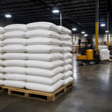 Calcium chloride 50 lb bags stacked on warehouse pallet — Alliance Chemical bulk supply