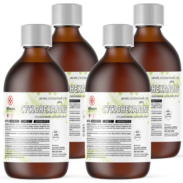 1-liter amber glass bottles of Cyclohexanone ACS grade reagent with NFPA health/fire labels, and Alliance Chemical safety
