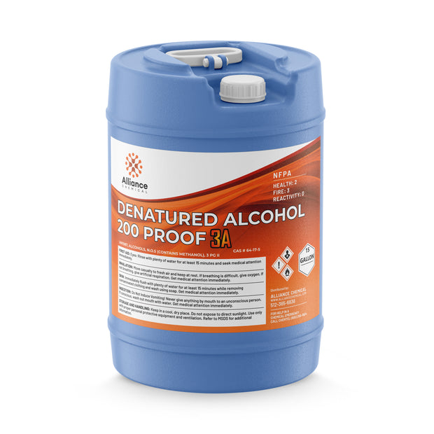 15-gallon HDPE carboy of Alliance Chemical 200-proof denatured alcohol 3A with NFPA diamond (2-3-0), and dual handles