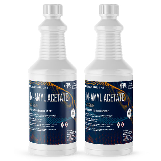 Two 1-quart plastic bottles of Alliance Chemical Amyl Acetate ACS Grade with white screw caps and product labels.