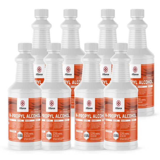 Eight 1-quart poly bottles of Alliance Chemical n-Propyl Alcohol with white screw caps and safety labels.
